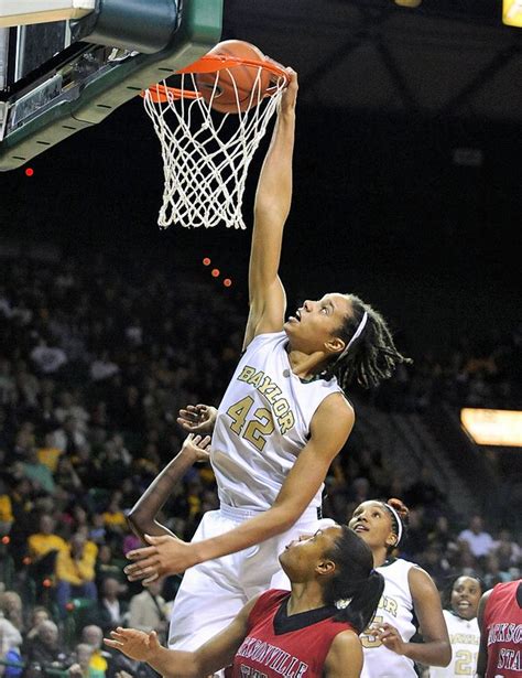 how-long-to-achieve-fame-in-sports-like-ashlyn-watkins female basketball player dunking