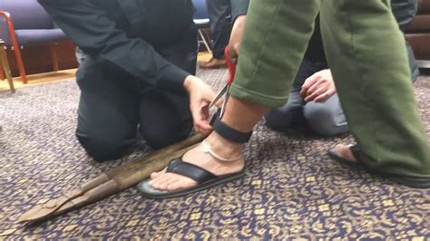 how-long-to-adjust-wearing-ice-ankle-monitor ICE ankle monitor on person