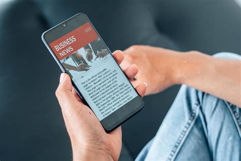 how-long-to-follow-bbc-sport-updates-daily person reading sports news on phone