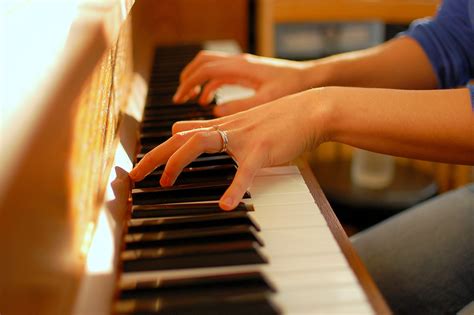 how-long-to-get-good-at-playing-corrupted-kitsune-grow-a-garden person playing piano sheet music