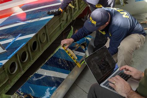 how-long-to-investigate-southwest-airlines-flight-collision NTSB investigators examining aircraft wreckage