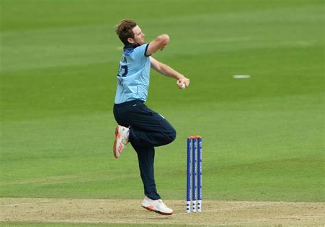 Liam Dawson playing cricket