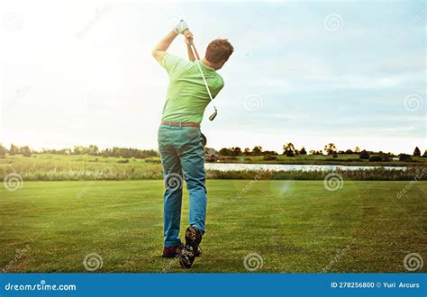 person practicing golf swing