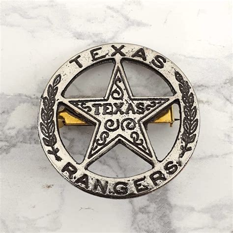 how-long-to-learn-history-of-texas-rangers Texas Rangers history book and badge