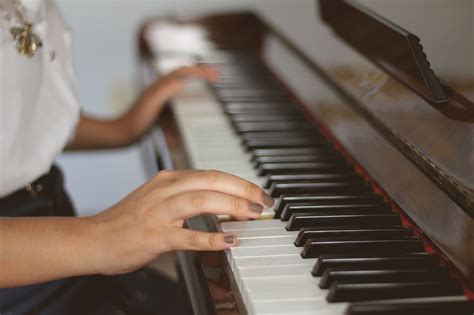 person playing piano practice