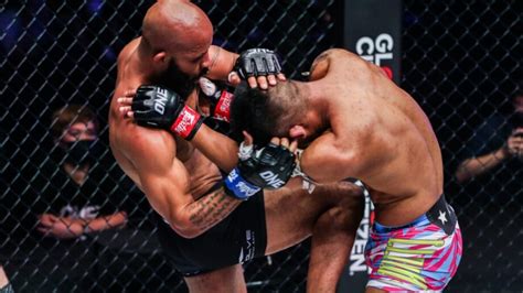 MMA fighter training wrestling and striking