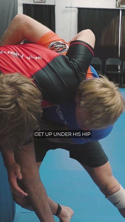 MMA fighter training wrestling techniques