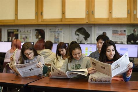 how-long-to-master-up-nyt-topics student reading newspaper