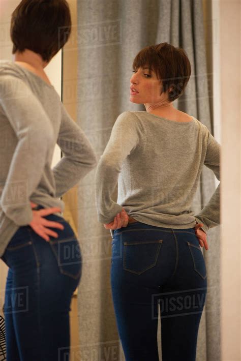 trying on jeans fitting room