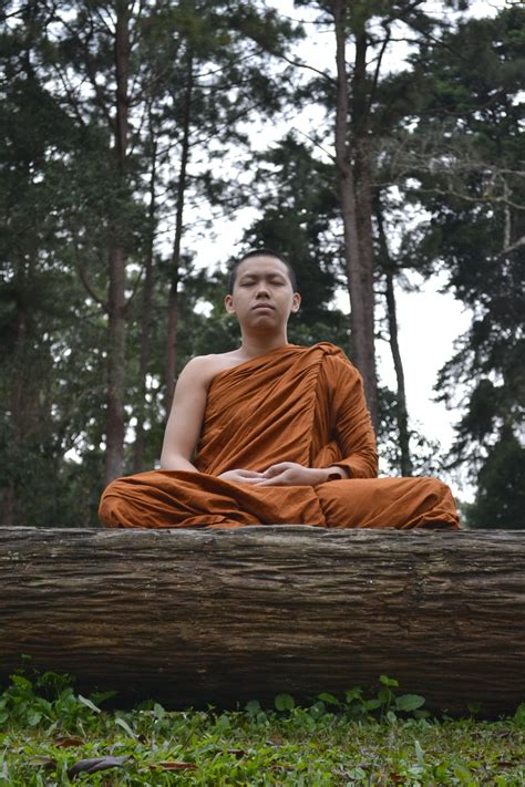 Buddhist monk teaching meditation