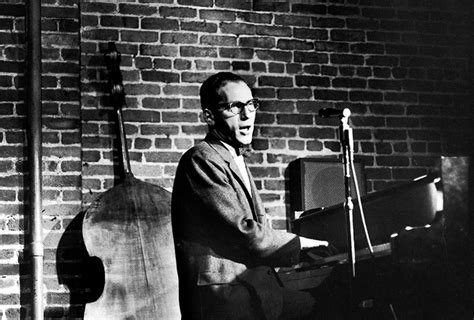 Tom Lehrer performing piano